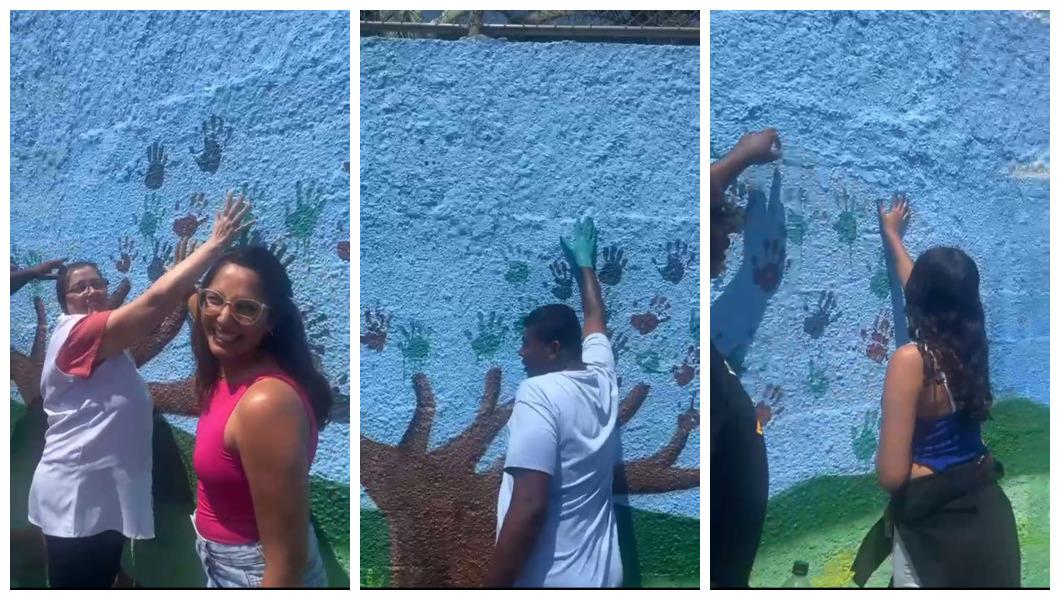 Educadores e alunos se unem e ilustram muro de escola no Aeroporto
